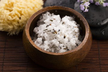 Homemade skin exfoliant (skin scrub) of sea salt, olive oil and