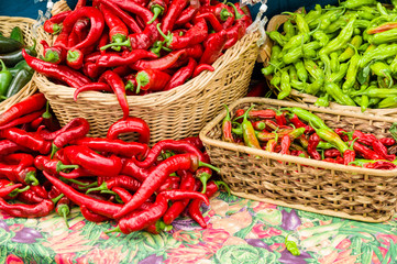 Red hot peppers in baskets