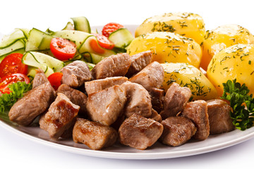 Grilled meat with boiled potatoes and vegetables 