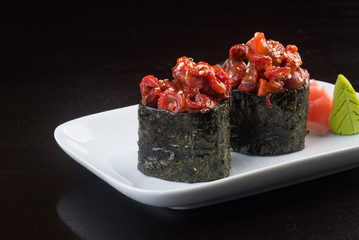 japanese cuisine. sushi octopus on the background