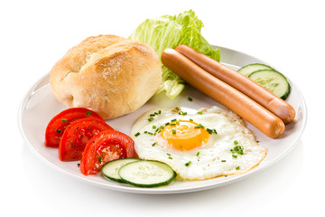 Breakfast - fried egg and sausages 