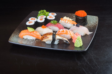 japanese cuisine. sushi set on the background