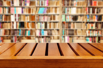 Empty wooden table and modern library background