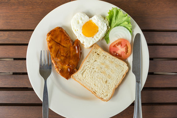 Breakfast with steak and fried egg