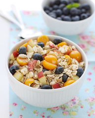 Healthy breakfast with muesli and blueberries
