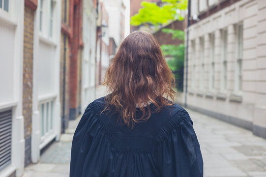 Young woman in graduation gown