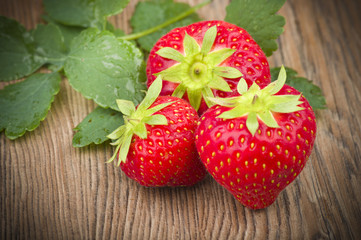 Fresh Strawberry close up on the wood