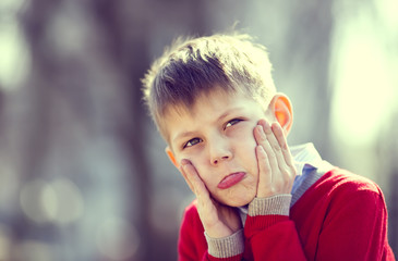 Portrait of a boy on a walk in the park