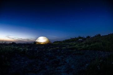 Lit Tent at Dusk