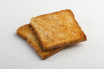 Two pieces of toast on the table