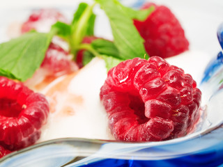 Vanilla ice cream with raspberries