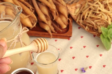 Galingale water and fresh galingale with honey.