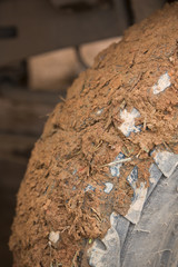 Close-up shot of wheel in dirt.