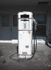 aged and worn vintage photo of old gas pump