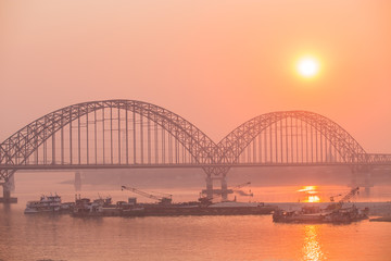 Yadanarbon bridge at sunset