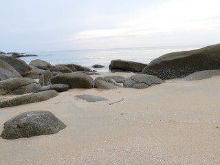 Fototapeta na wymiar view of the beach, stone, sky and sea