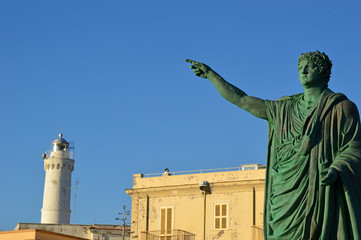 The statue of Emperor Nerone and the lighthouse at Anzio