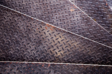 Aluminium dark list with rhombus shapes