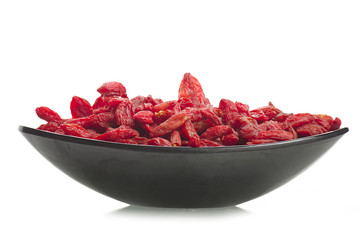 Bowl with Group of Goji berry on the white
