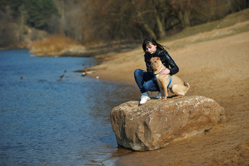 girl with dog in the park