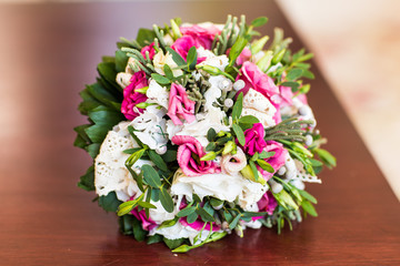 Bridal bouquet of various flowers.