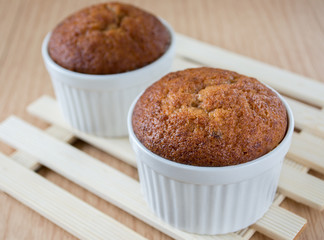 banana muffin cake on wooden background 