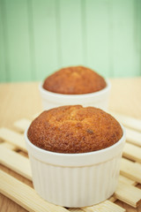 banana muffin cake on wooden background 