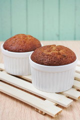 banana muffin cake on wooden background 