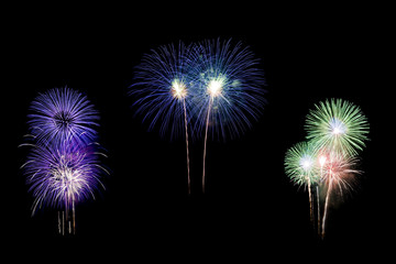 Individual colorful fireworks isolated on black background.