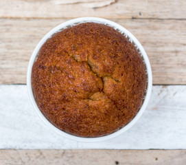 banana muffin cake on wooden background 