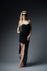 Beauty blonde girl with carnival mask