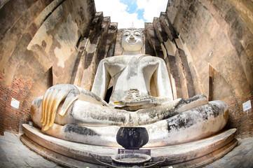 SUKHOTHAI THAILAND: The Main Buddha with golden hand in the temple of Sukhothai historical park in Sukhothai, Thailand

