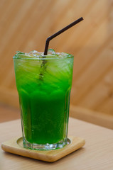 A glass of kiwi soda
