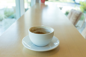 hot of coffee drink on wooden table bar in the cafe