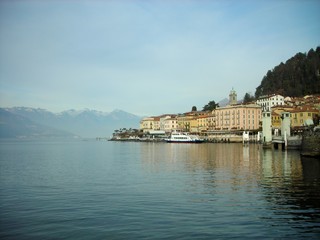 Fototapeta na wymiar Picturesque little Italian town of Varenna located on the shore of Lake Como in Lombardy, Italy, on a sunny day.
