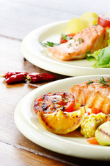 Fried salmon fillet with vegetables
