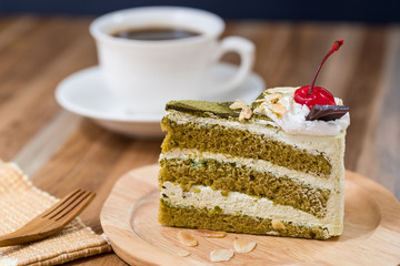 green tea cake with a coffee cup