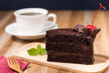 chocolate cake with a coffee cup
