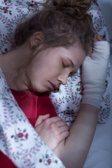 Ill woman with broken hand