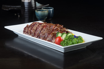 japanese cuisine. fried fish on the background