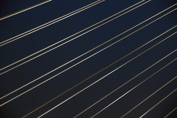 Cables of the cable bridge at night