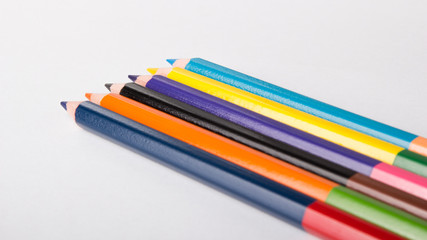 Colour pencils isolated on white background close up