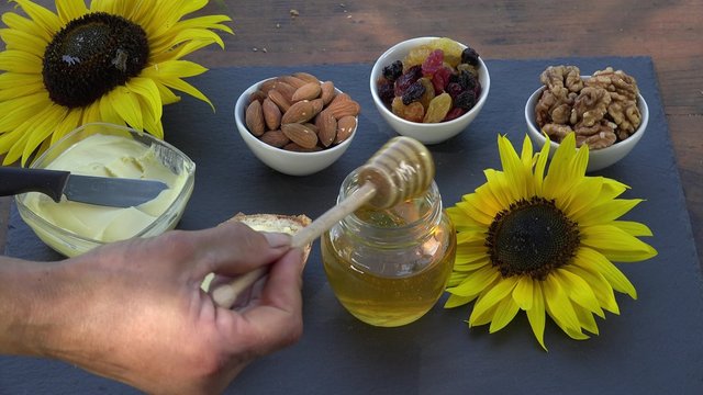 Honey, bread, butter and dried fruit