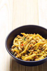 Thai spicy bamboo shoot salad on wooden table background