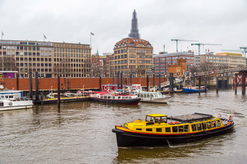 Obraz premium Tourist boat in Port of Hamburg, Elb Channel