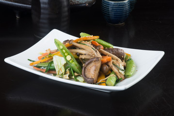japanese cuisine. fried mix vegetables on the background