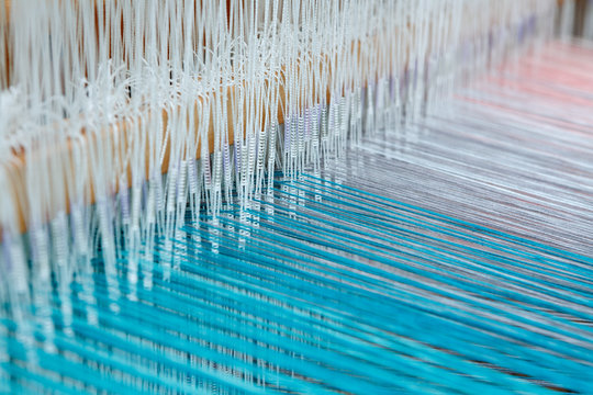 Colorful Threads In A Loom