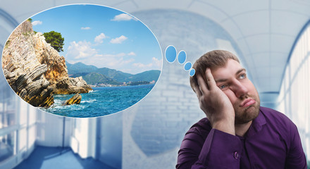 Sad man dreaming about vacation