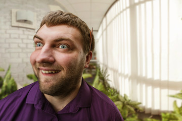 Obraz premium Strange funny man in the office