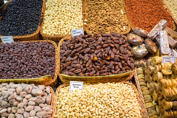 Different kinds of nuts and dry fruits at the Boqueria market in Barcelona